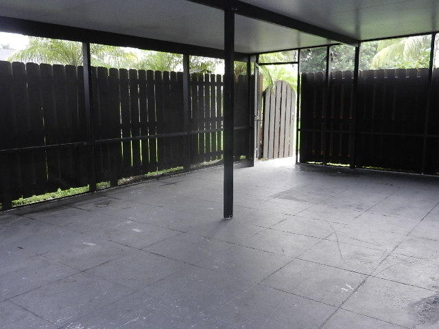 1023 Springdale Court Palm Springs, FL 33461 - Photo 2 of 15 covered patio