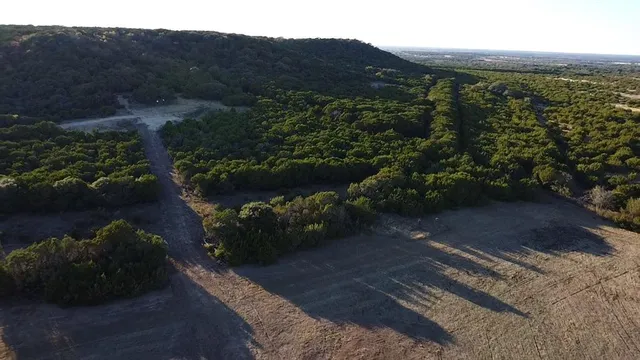 a view of a street with a mountain view