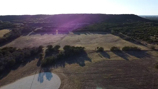a view of a lake in middle of the town