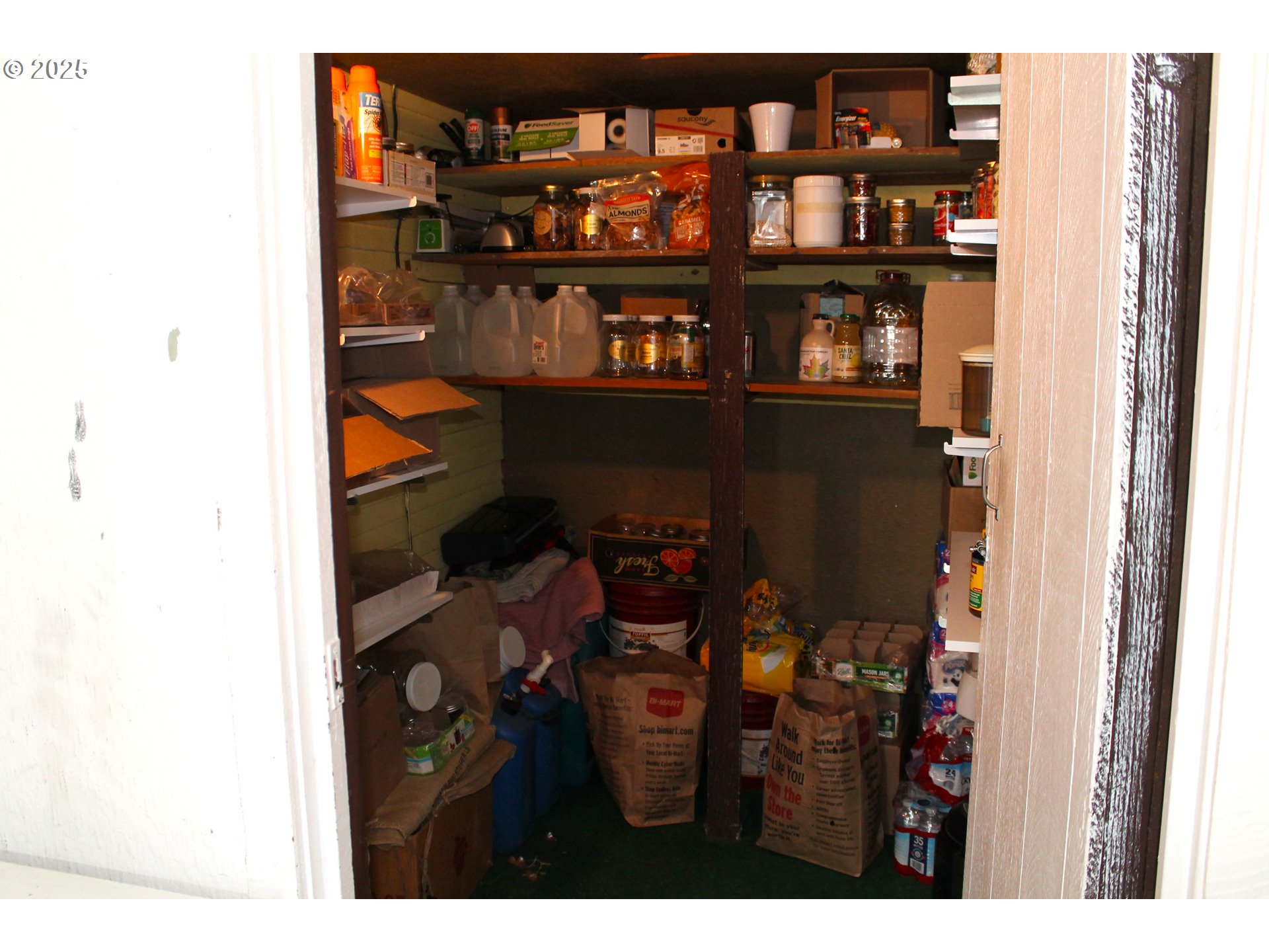 410 Northwest Bridge Street John Day, OR 97845 - Photo 12 of 19 a view of a dining room with shelves