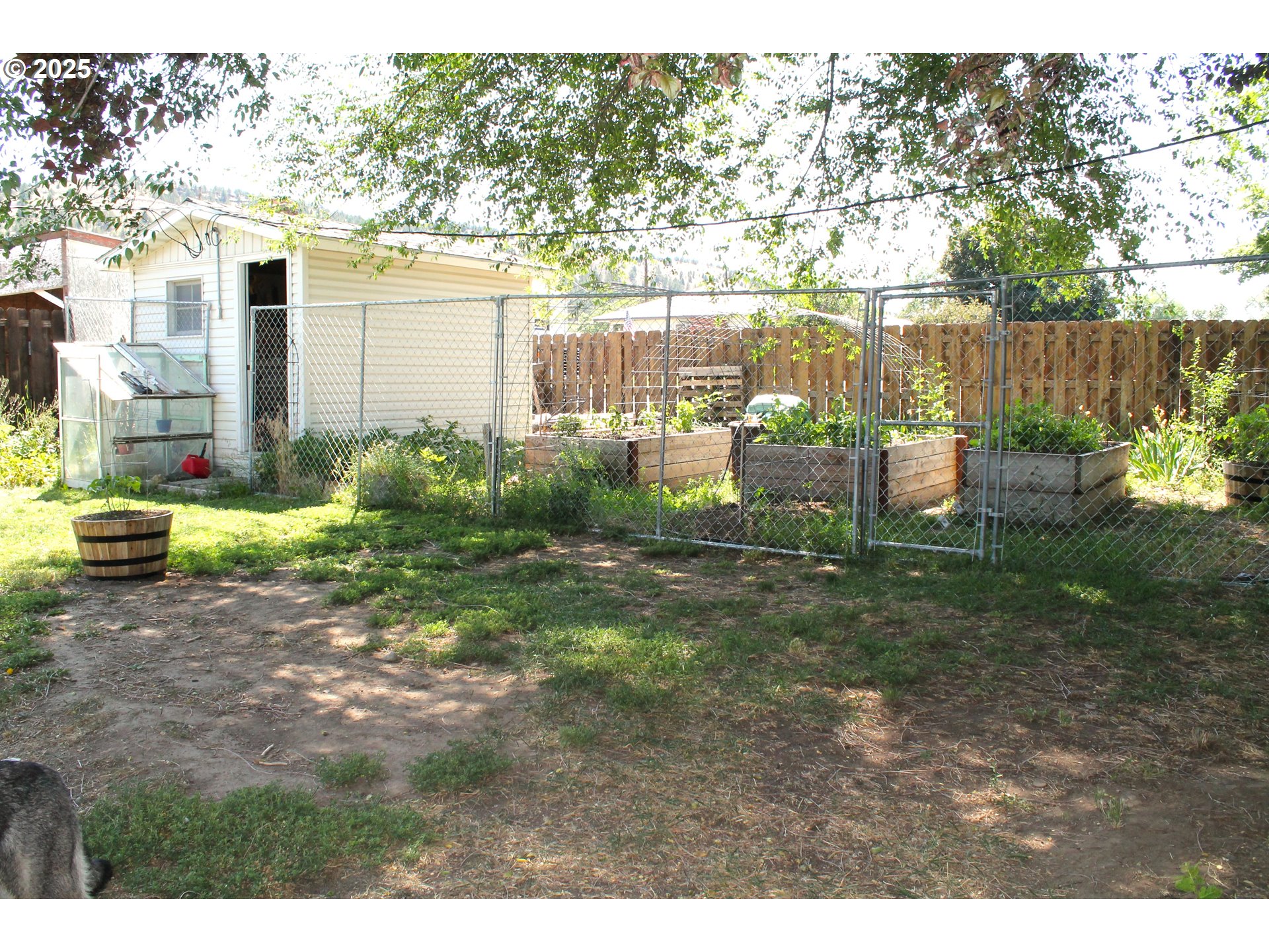 410 Northwest Bridge Street John Day, OR 97845 - Photo 14 of 19 a view of backyard with outdoor seating and green space