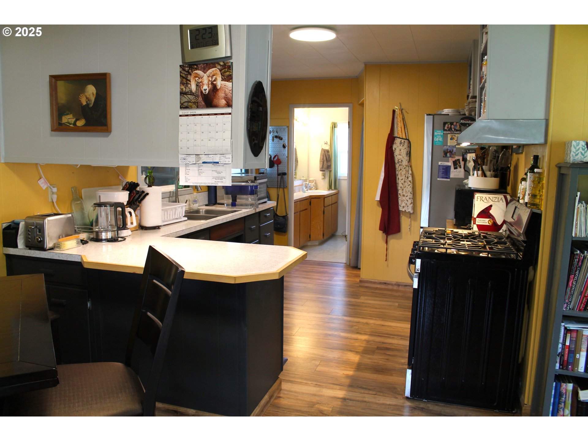410 Northwest Bridge Street John Day, OR 97845 - Photo 7 of 19 a kitchen with a sink and cabinets