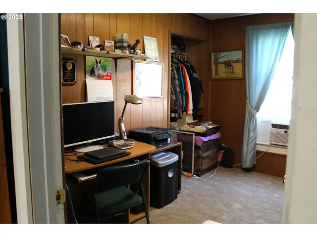 a room with furniture and washer