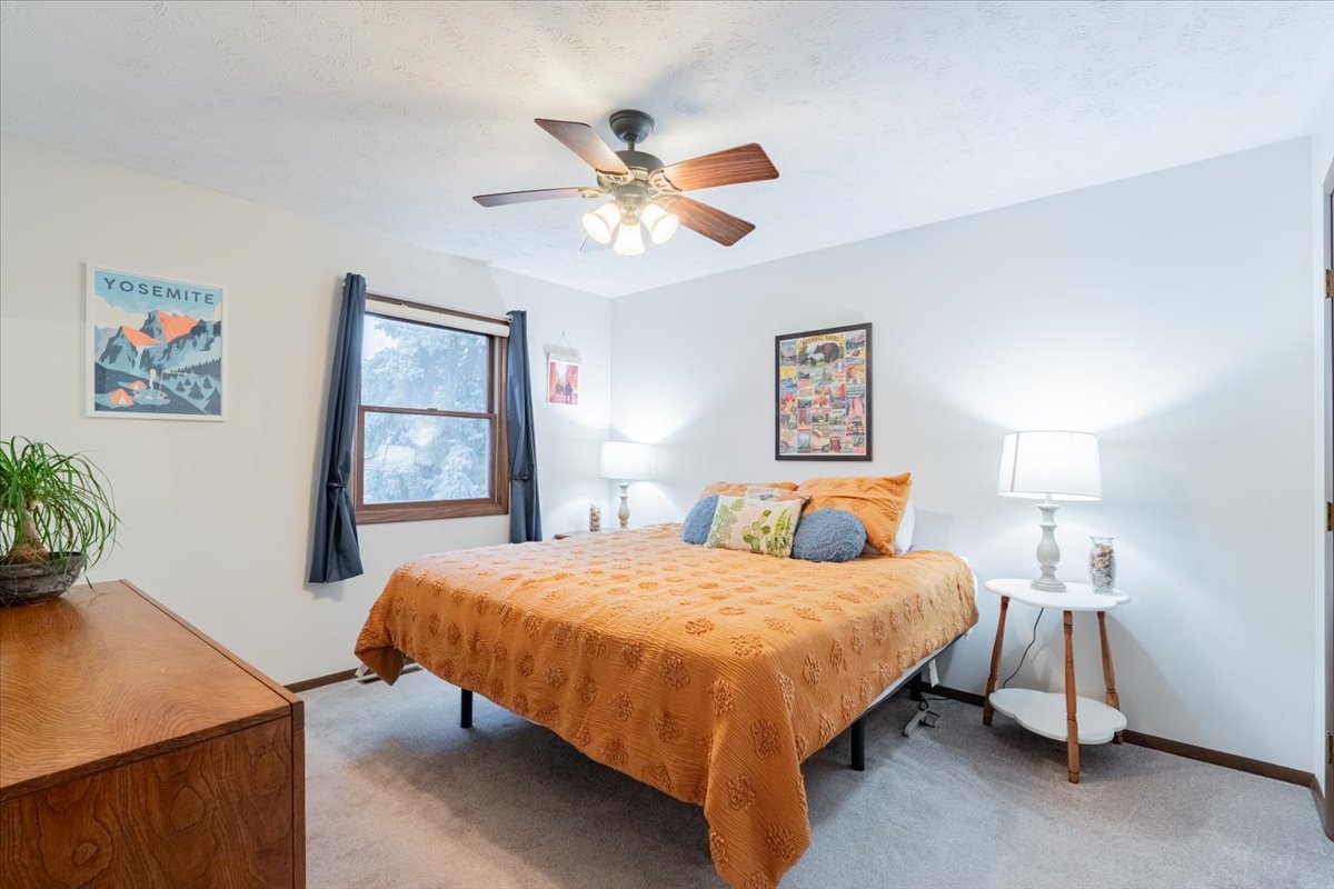 1014 North Fell Avenue Normal, IL 61761 - Photo 12 of 31 a bedroom with a bed and a table