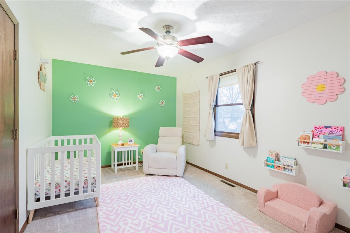 1014 North Fell Avenue Normal, IL 61761 - Photo 14 of 31 a living room with furniture and a large window