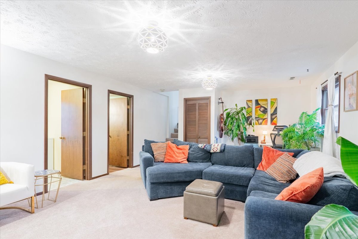 1014 North Fell Avenue Normal, IL 61761 - Photo 19 of 31 a living room with furniture and a large window