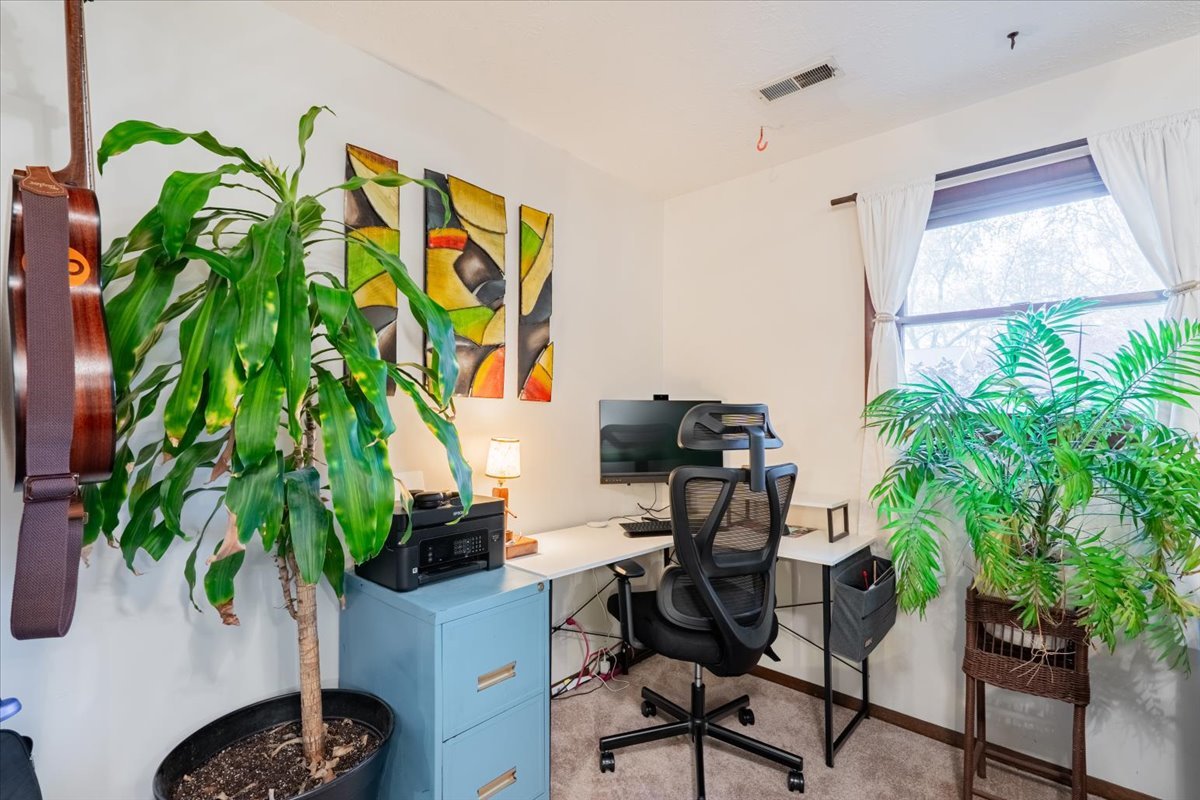 1014 North Fell Avenue Normal, IL 61761 - Photo 21 of 31 a workspace with plants