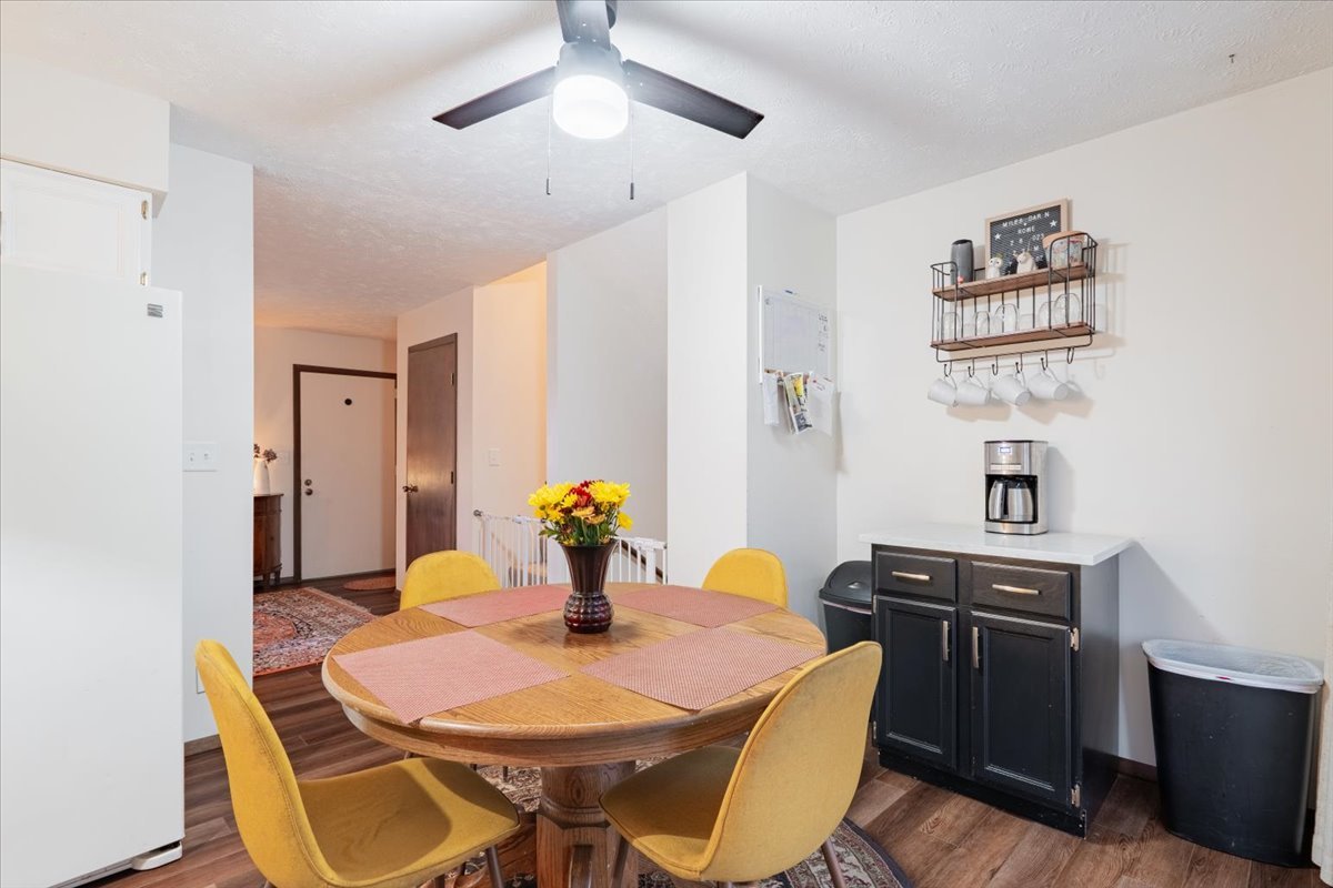 1014 North Fell Avenue Normal, IL 61761 - Photo 8 of 31 a view of a dining room with a table and chairs