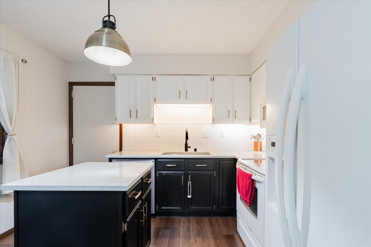1014 North Fell Avenue Normal, IL 61761 - Photo 9 of 31 a kitchen with a sink a stove and cabinets