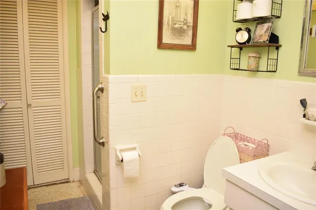 a bathroom with a sink and toilet
