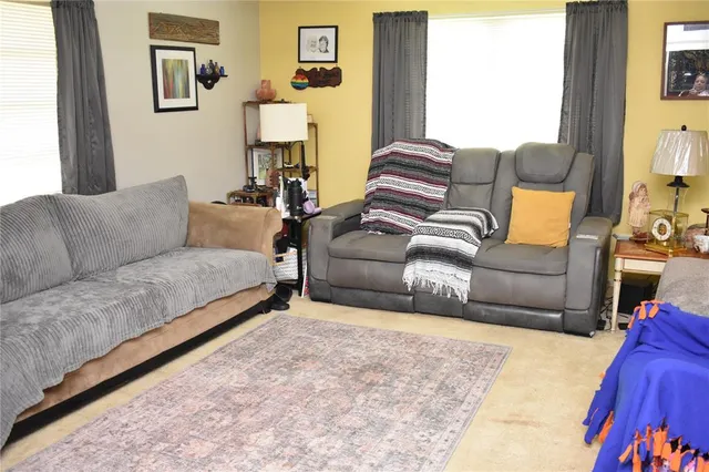 a living room with furniture and a couch