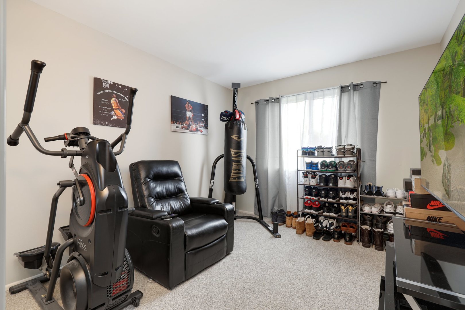 223 Pheasant Road Matteson, IL 60443 - Photo 15 of 19 a room with gym equipment and windows