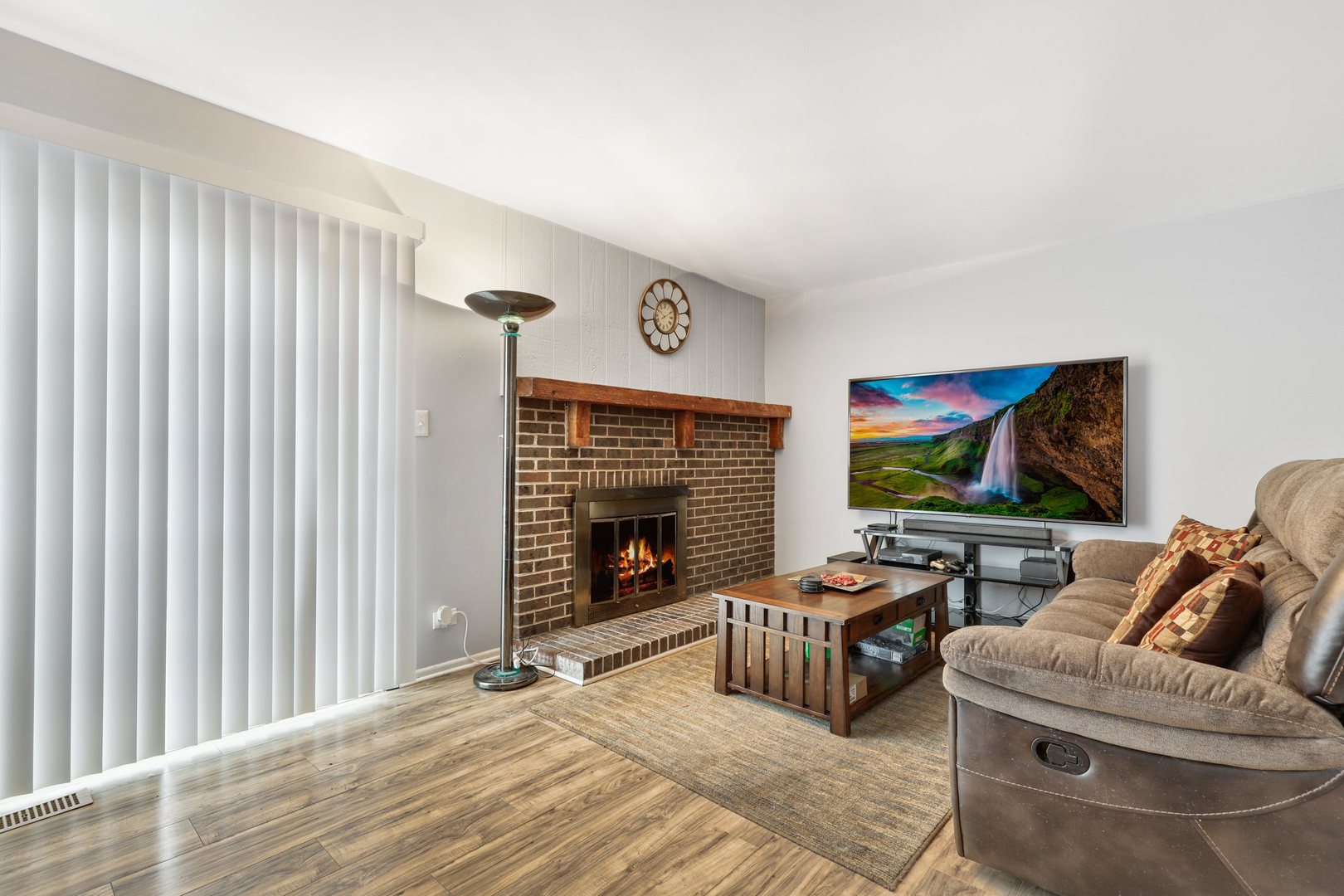 223 Pheasant Road Matteson, IL 60443 - Photo 8 of 19 a living room with furniture and a fireplace