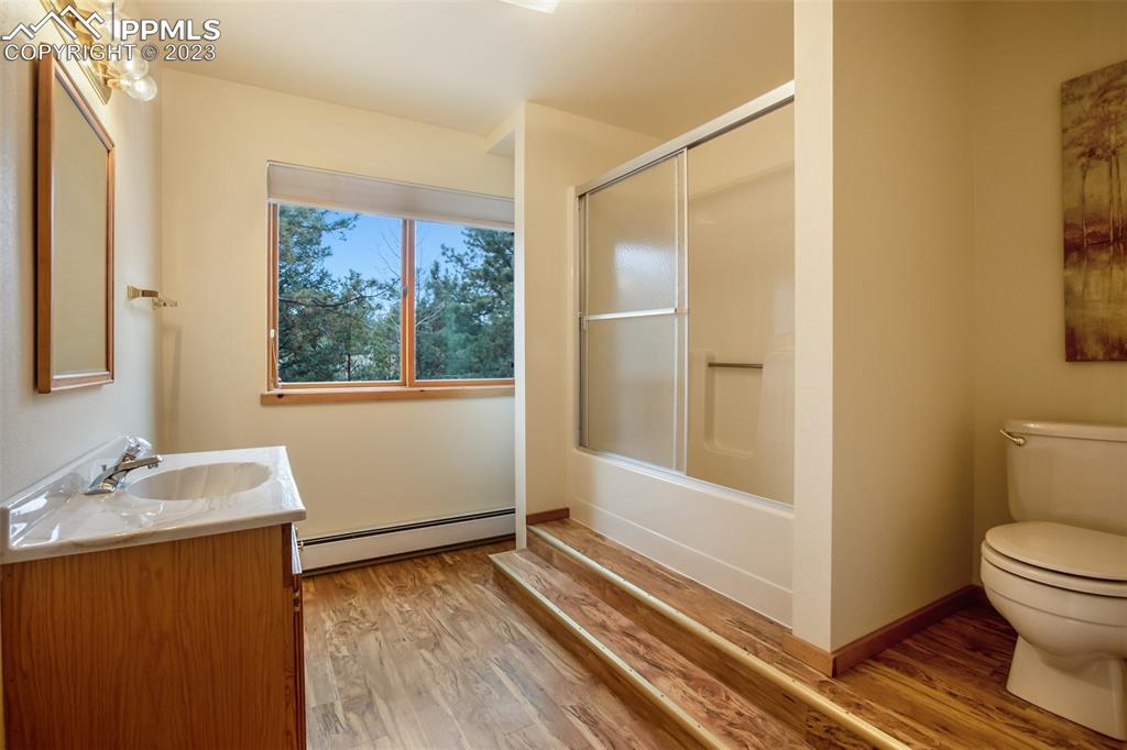 265 Broken Wheel Drive Divide, CO 80814 - Photo 26 of 50 a bathroom with a sink and a mirror