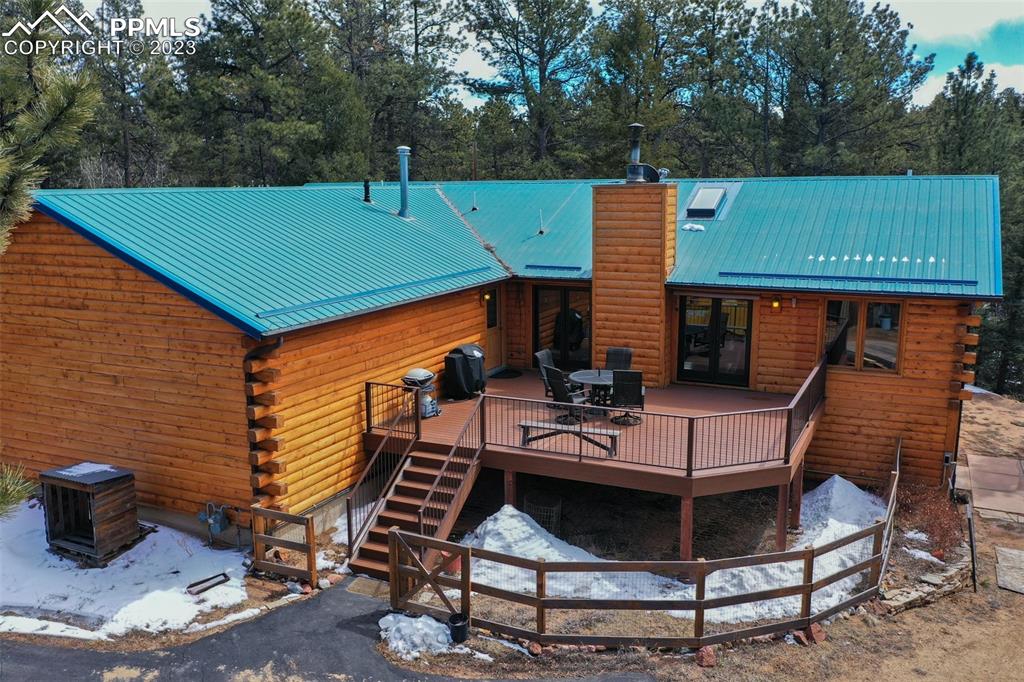265 Broken Wheel Drive Divide, CO 80814 - Photo 31 of 50 a backyard of a house with seating space