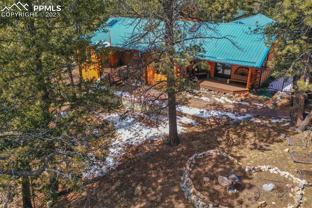 265 Broken Wheel Drive Divide, CO 80814 - Photo 47 of 50 a backyard of a house with lots of green space