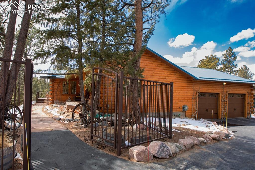 265 Broken Wheel Drive Divide, CO 80814 - Photo 49 of 50 a view of a house with a yard