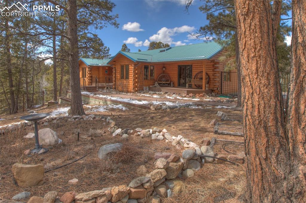 265 Broken Wheel Drive Divide, CO 80814 - Photo 50 of 50 a view of a house with yard and tree s