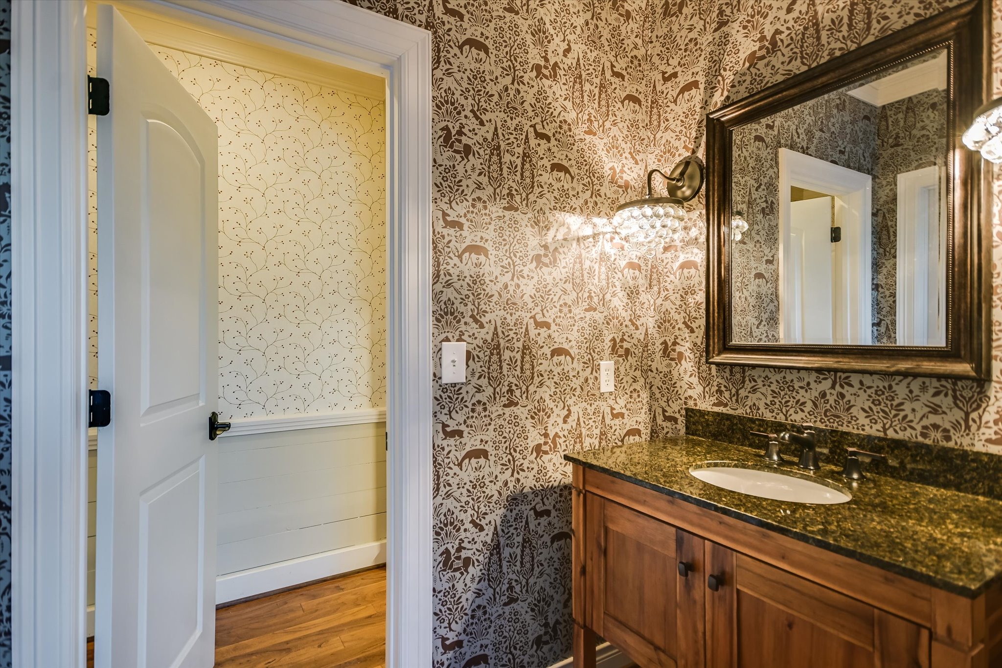 1984 Divide Pass Blanco, TX 78606 - Photo 12 of 31 a bathroom with a granite countertop sink a mirror and a shower