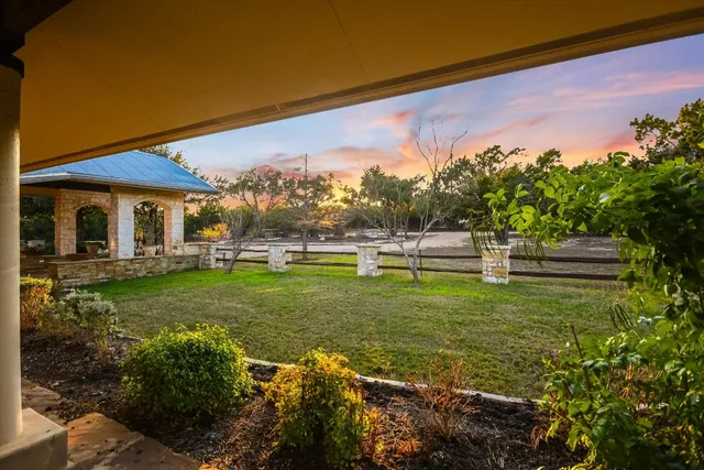 a view of a house with a big yard