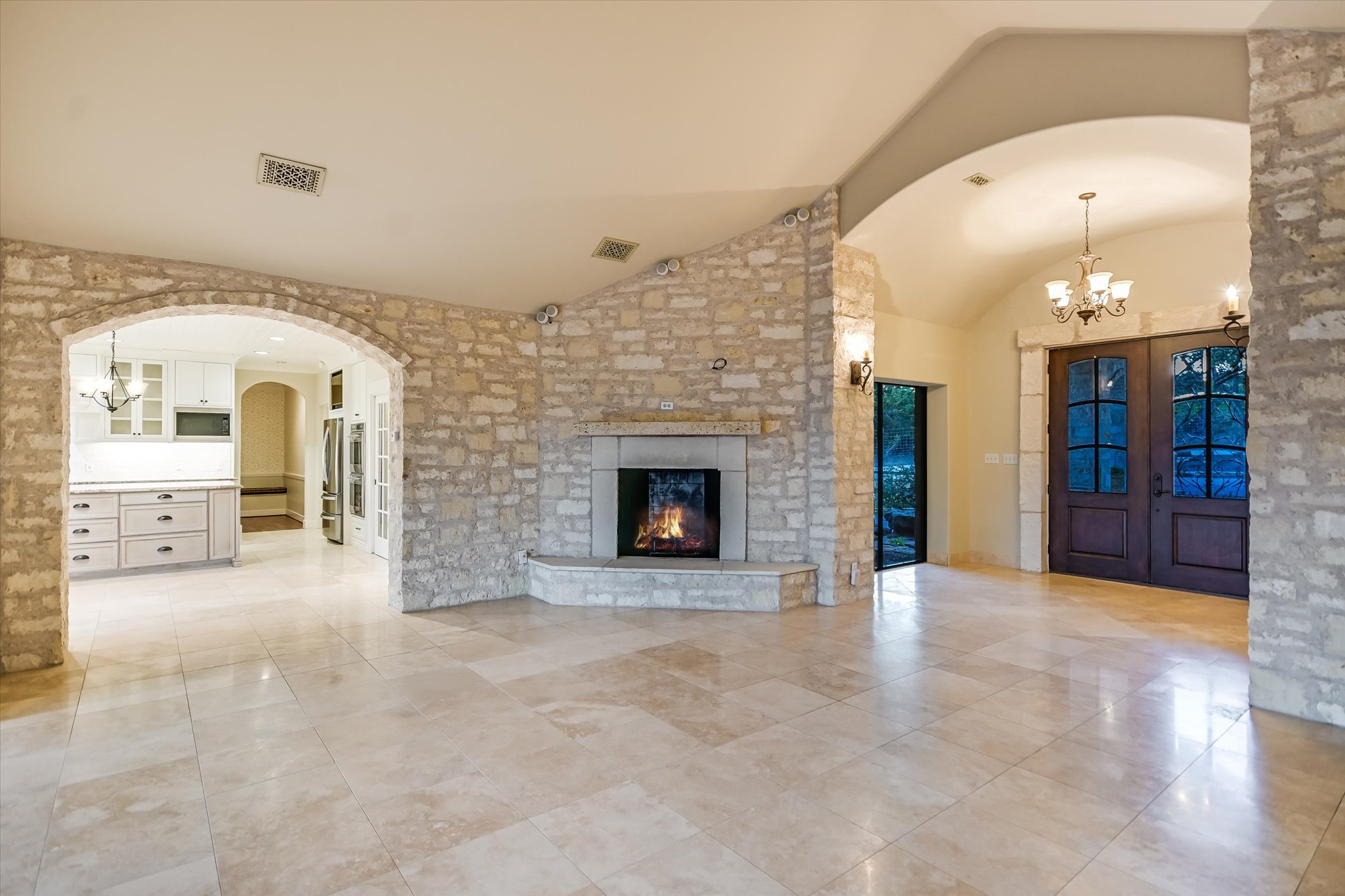 1984 Divide Pass Blanco, TX 78606 - Photo 5 of 31 a view of an empty room with a fireplace and a window