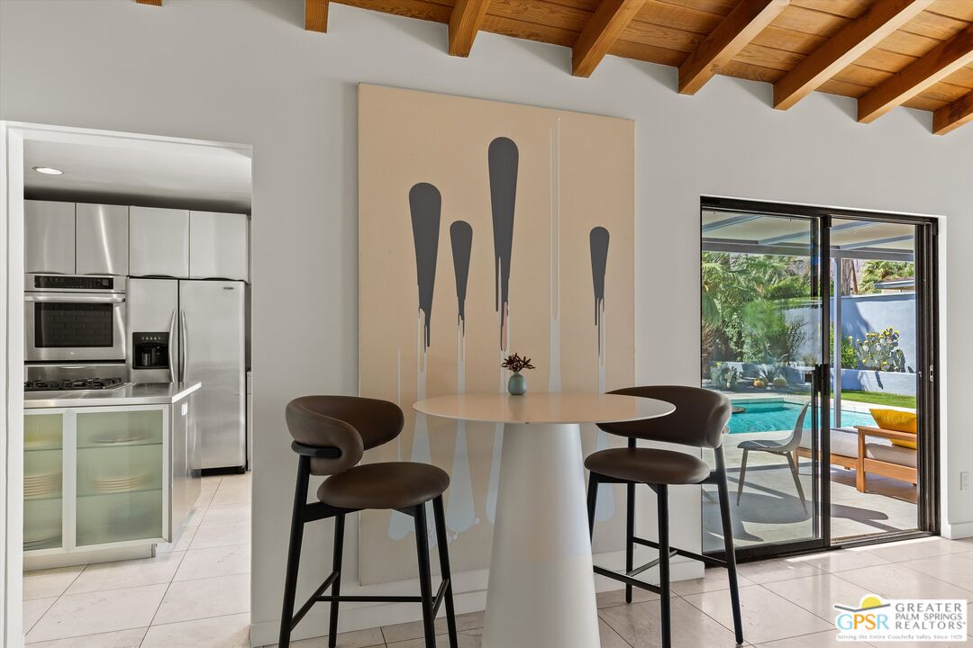 1465 North Rodeo Road Palm Springs, CA 92262 - Photo 13 of 43 a view of a dining room with furniture window and outside view