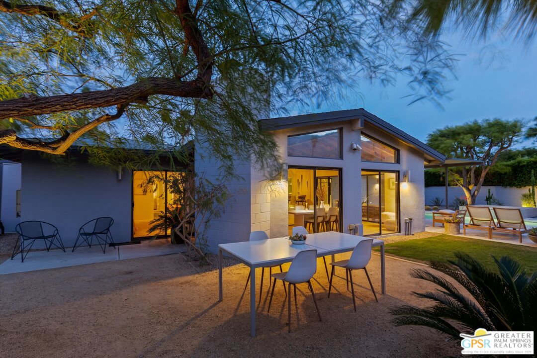 1465 North Rodeo Road Palm Springs, CA 92262 - Photo 27 of 43 a view of a chairs and table in the patio