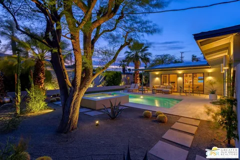 a view of swimming pool with a patio