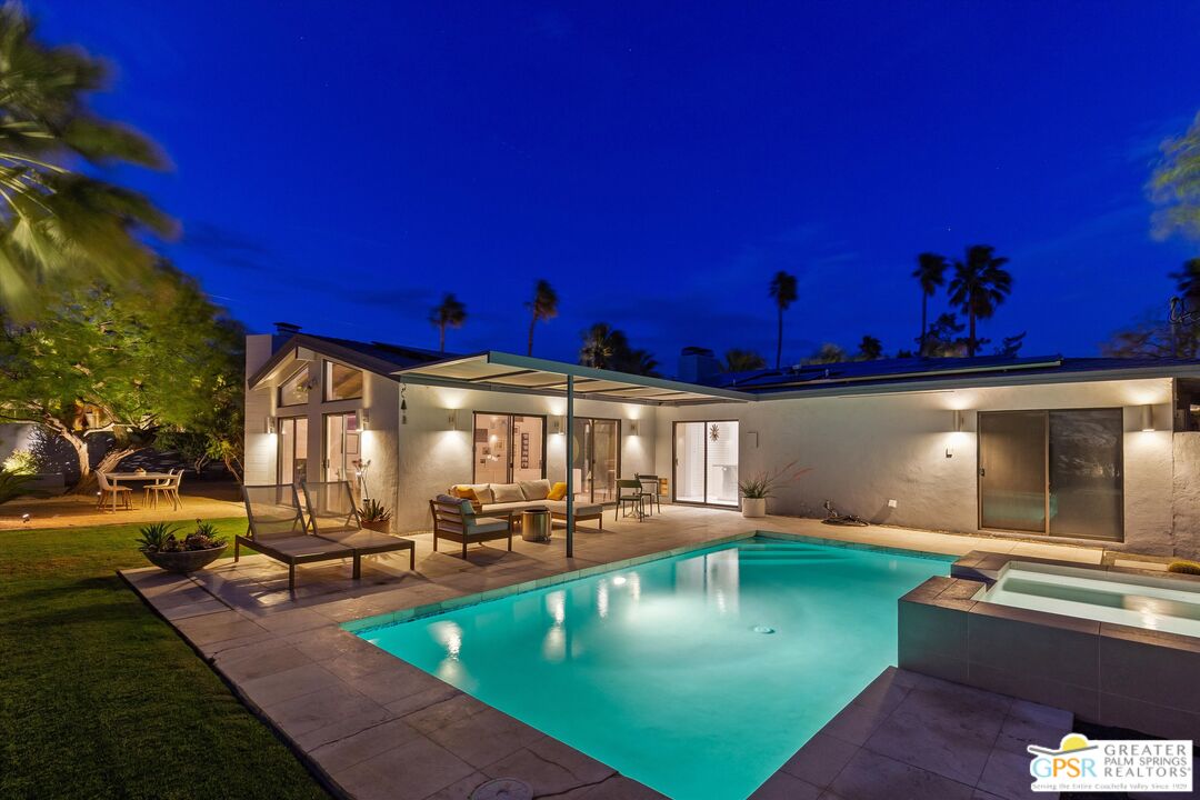 1465 North Rodeo Road Palm Springs, CA 92262 - Photo 32 of 43 a view of a swimming pool with outdoor seating