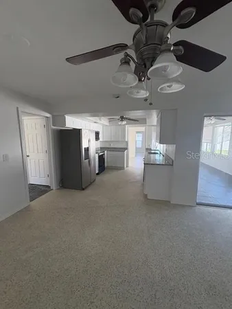a view of a kitchen with a sink