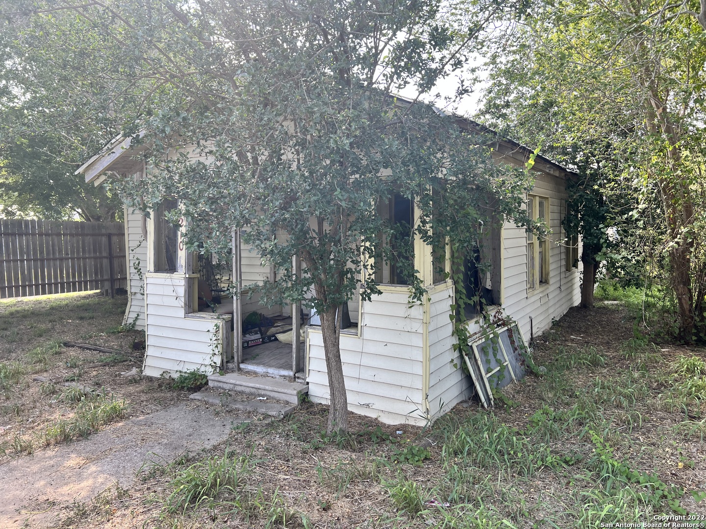 1210 King David Drive Three Rivers, TX 78071 - Photo 2 of 17 a view of a house with a yard and tree s