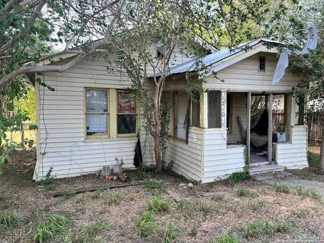 a front view of a house with a porch