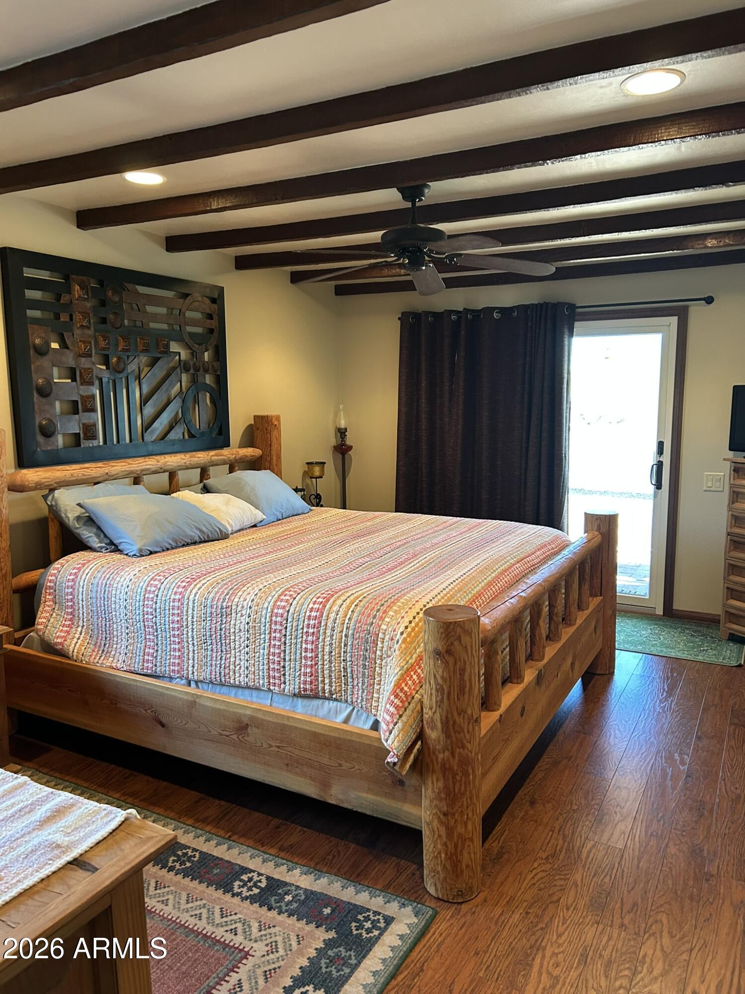 1172 West Mountain View Green Valley, AZ 85622 - Photo 19 of 35 a bedroom with a bed and a window