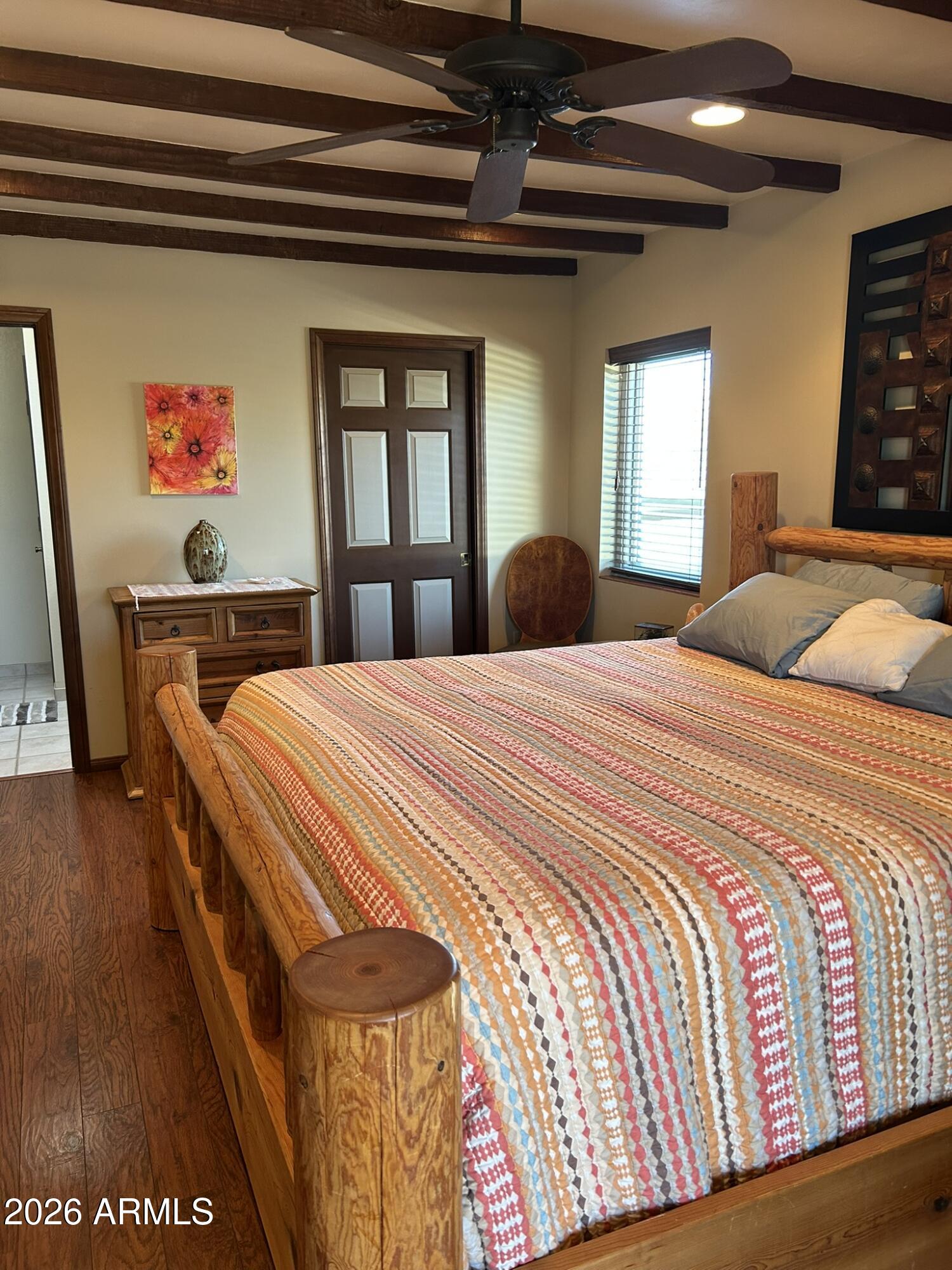 1172 West Mountain View Green Valley, AZ 85622 - Photo 20 of 35 a bedroom with a bed and window