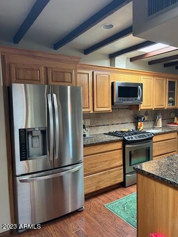 1172 West Mountain View Green Valley, AZ 85622 - Photo 2 of 25 a kitchen with stainless steel appliances granite countertop a refrigerator stove and microwave