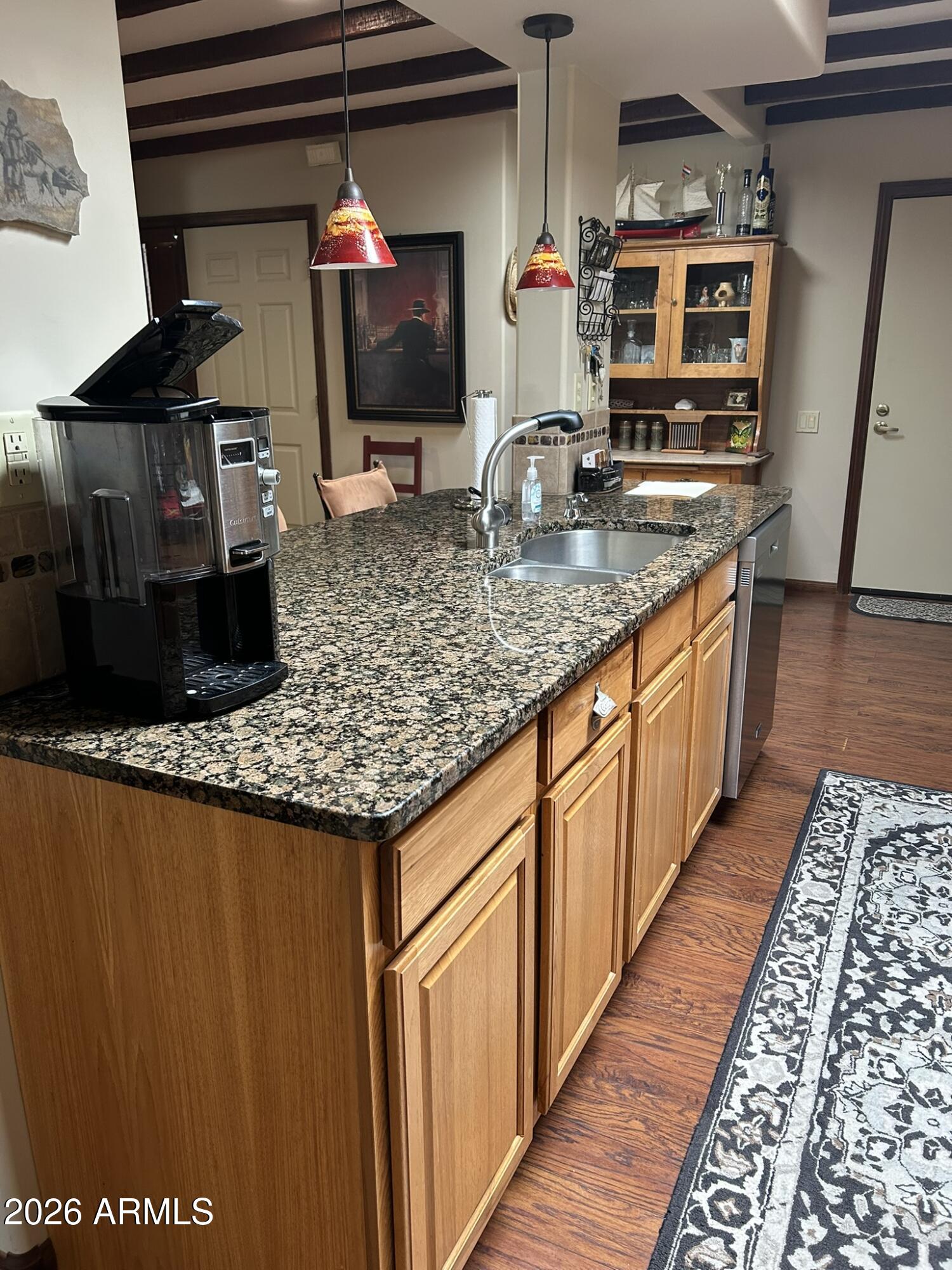 1172 West Mountain View Green Valley, AZ 85622 - Photo 5 of 35 a kitchen with stainless steel appliances granite countertop a sink stove and refrigerator