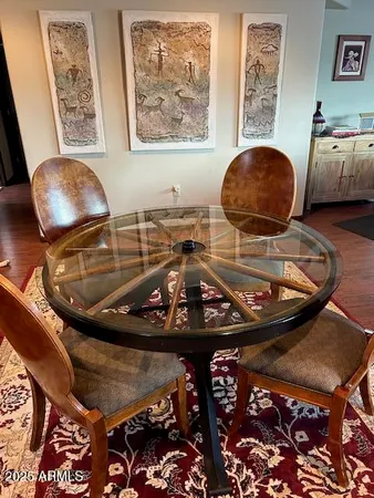 a room with furniture and wooden floor