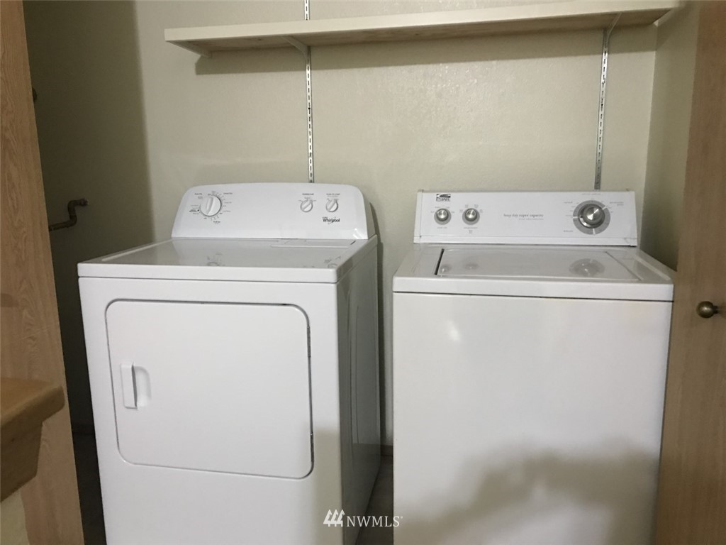 115 Union Avenue Northeast Renton, WA 98059 - Photo 13 of 20 a utility room with dryer and washer