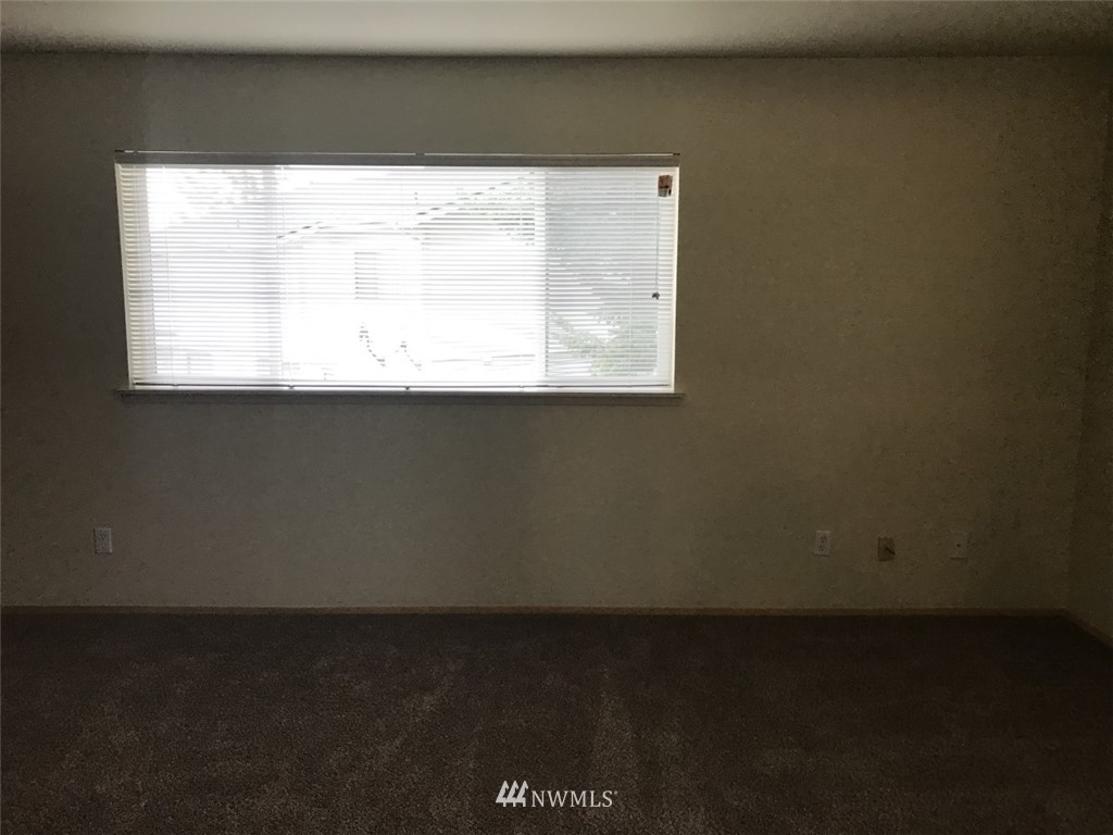 115 Union Avenue Northeast Renton, WA 98059 - Photo 17 of 20 a view of a window in a room