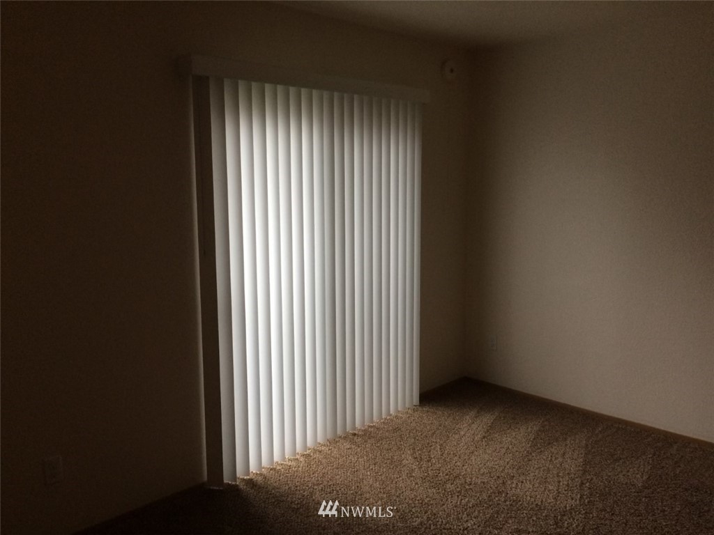 115 Union Avenue Northeast Renton, WA 98059 - Photo 20 of 20 a view of a room that has a window in it