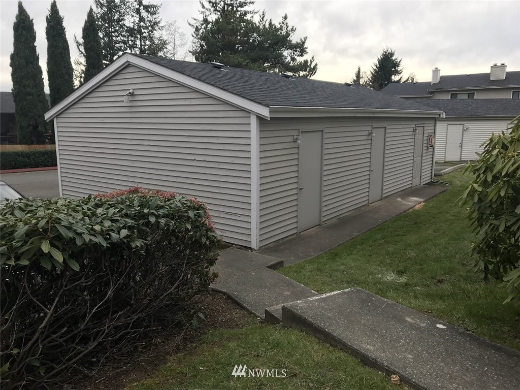 115 Union Avenue Northeast Renton, WA 98059 - Photo 3 of 20 a view of a house with a yard