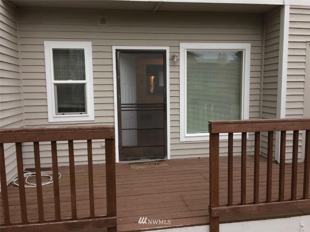 115 Union Avenue Northeast Renton, WA 98059 - Photo 5 of 20 a view of a balcony from a window