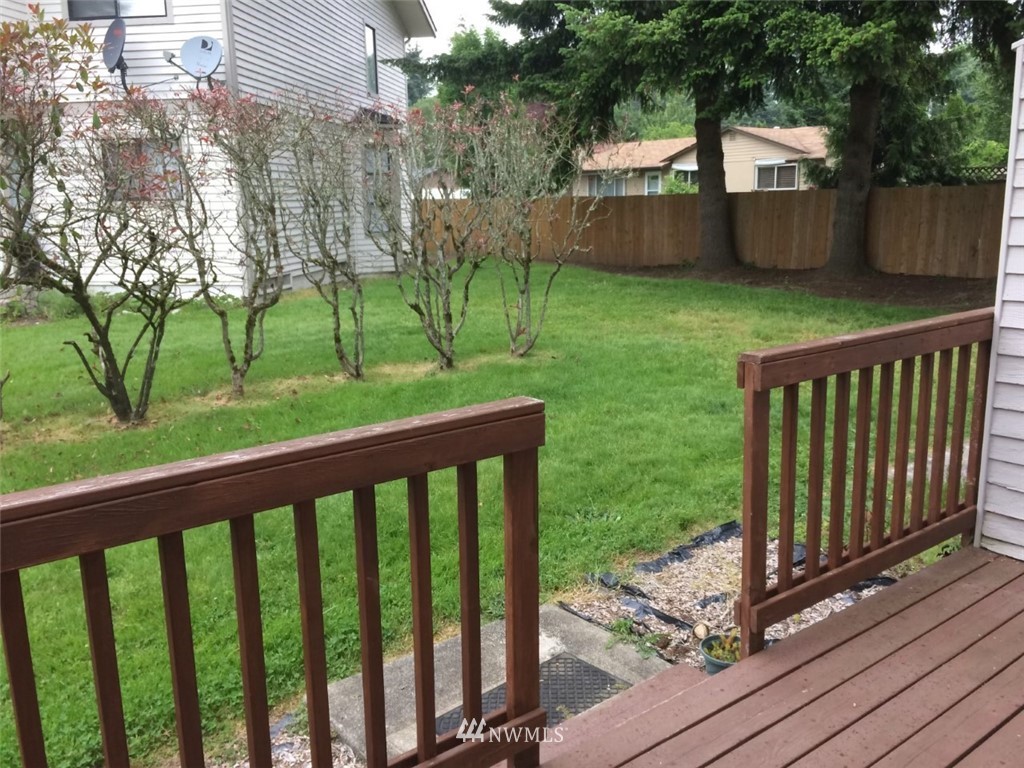 115 Union Avenue Northeast Renton, WA 98059 - Photo 6 of 20 a view of a porch with a yard