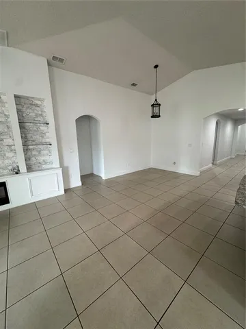 a room with washing machine and a sink