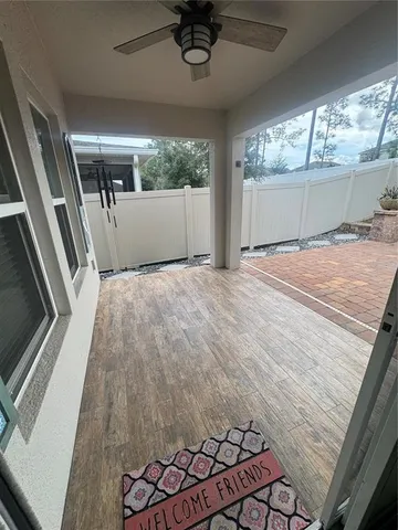a view of porch with yard