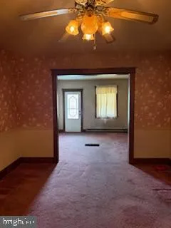 a view of a room that has a window in it