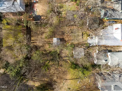 a view of a yard with trees