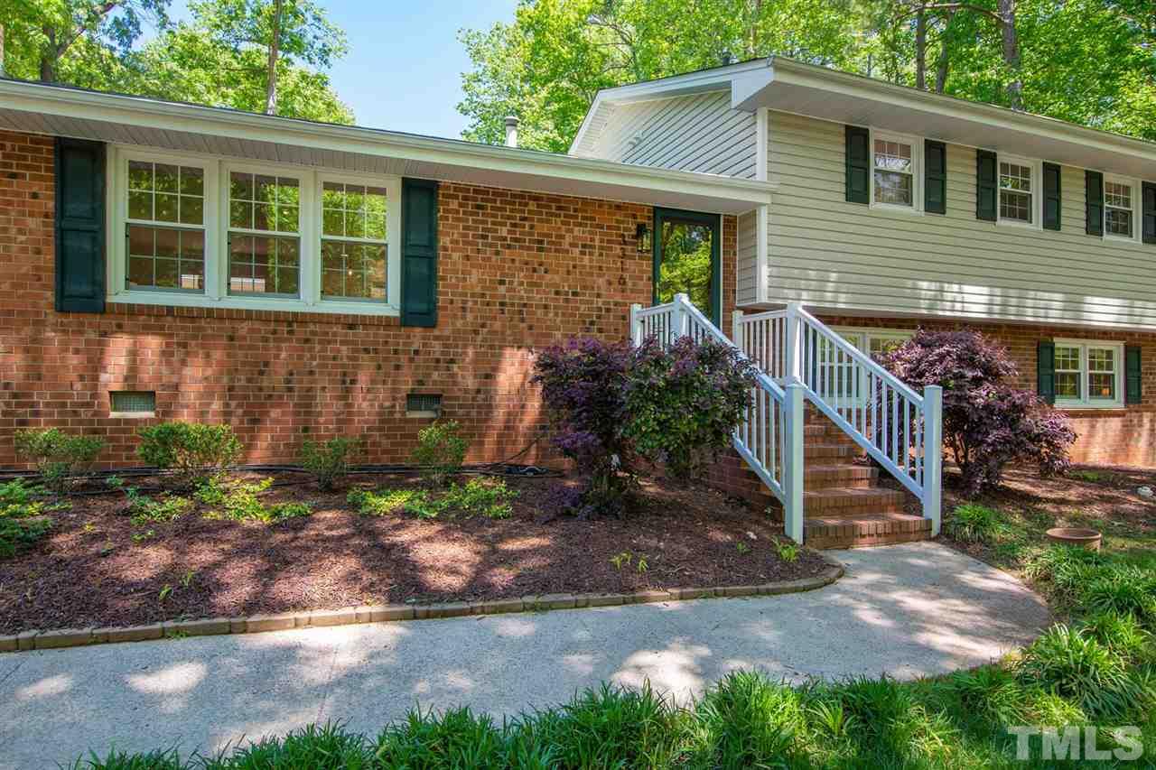 3316 Mesa Court Raleigh, NC 27607 - Photo 3 of 30 a front view of a house with a yard