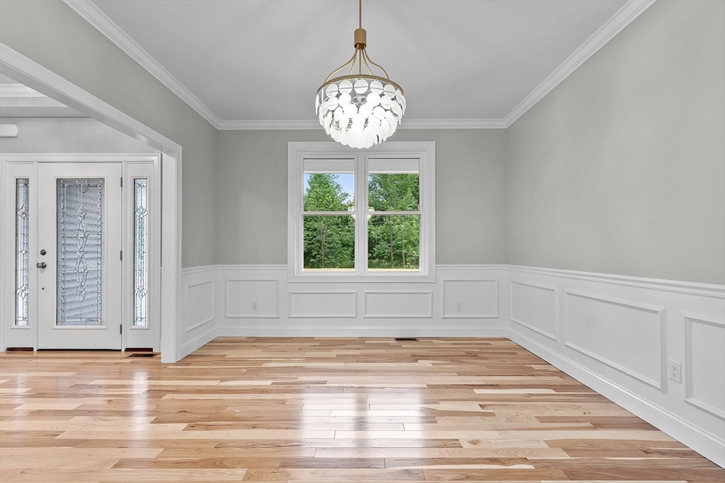 186 Justice Hill Road, Unit OAKMONT Sterling, MA 01564 - Photo 14 of 34 a view of an empty room with a window