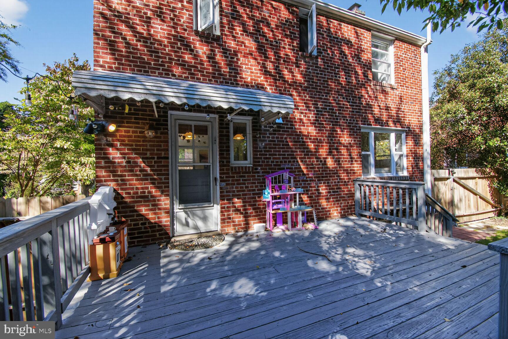 10021 Tenbrook Drive Silver Spring, MD 20901 - Photo 19 of 21 a view of a house with barbeque outdoor seating